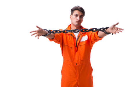 Prisoner with his hands chained isolated on white backgroundの写真素材