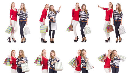 Friends with shopping bags isolated on whiteの写真素材