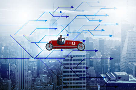 Businessman driving sports car choosing different career pathsの写真素材