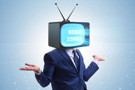Man with television head in tv addiction conceptの写真素材