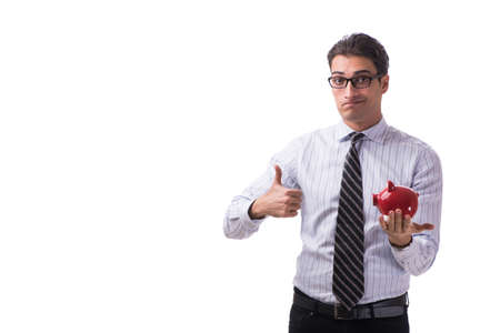 Young businessman with piggybank isolated on white backgroundの写真素材