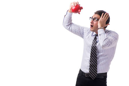 Young businessman with piggybank isolated on white backgroundの写真素材