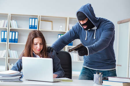 Criminal taking businesswoman as hostage in office