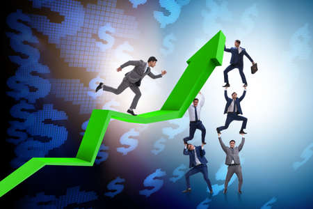 Businessman supporting growtn in economy on chart graph