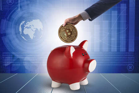 Bitcoin saving with piggybank in business conceptの写真素材