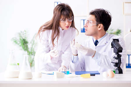 Two lab doctor testing food productsの写真素材