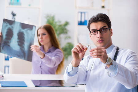 Doctor examining x-ray images of patient