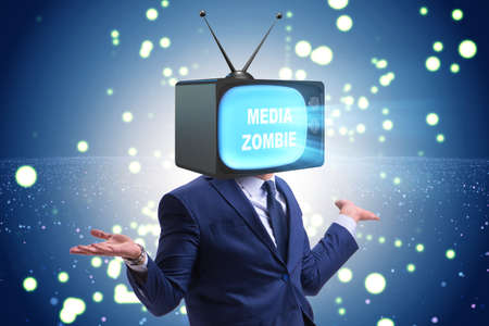 Man with television head in tv addiction conceptの写真素材