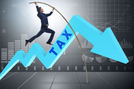 Businessman jumping over tax in tax evasion avoidance conceptの写真素材