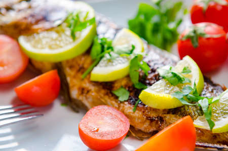 Fried fish served on the plate