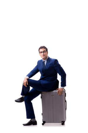 Young businessman with suitcase isolated on white backgroundの写真素材