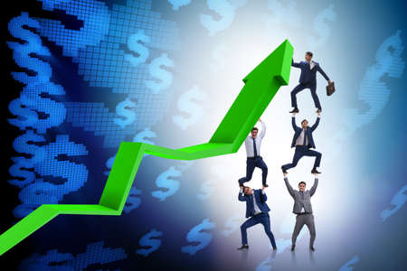 Businessman supporting growtn in economy on chart graph
