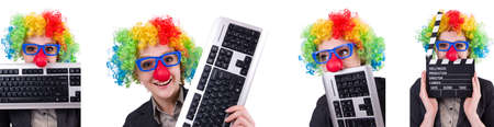 Businessman with clown wig isolated on whiteの写真素材