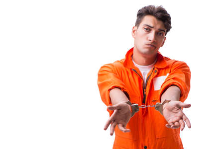 Handcuffed handsome businessman isolated on white backgroundの写真素材