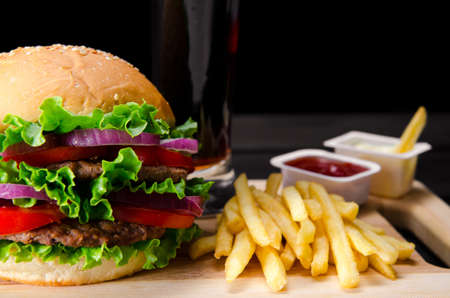 Burger served in bun in nutrition fast food conceptの写真素材