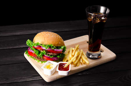 Burger served in bun in nutrition fast food conceptの写真素材