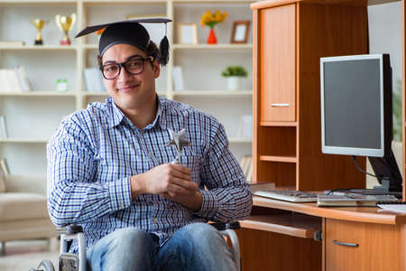 Disabled student studying at home on wheelchair