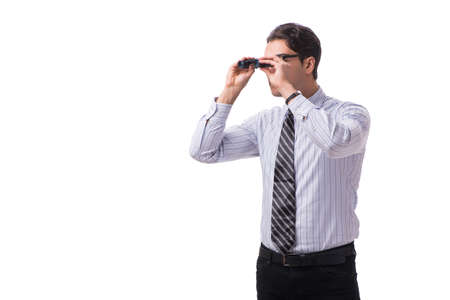 Young handsome businessman looking into future with binocularsの写真素材