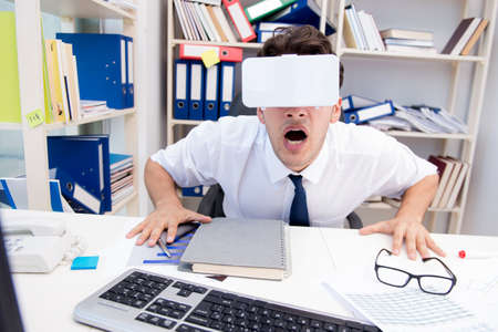 Employee watching movie on vr virtual reality glasses