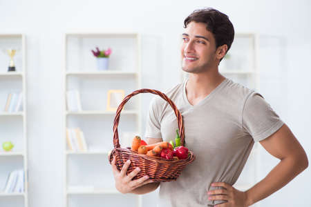 Young man in healthy eating and dieting conceptの写真素材