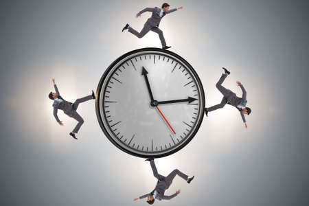 Businessman in time management conceptの写真素材