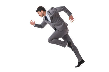 Young businessman running forward isolated on whiteの写真素材