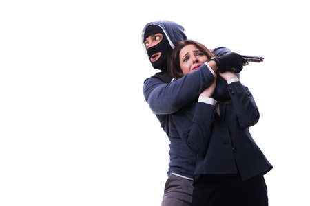 Businesswoman is kidnapped by the gunmanの写真素材