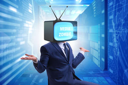 Man with television head in tv addiction conceptの写真素材