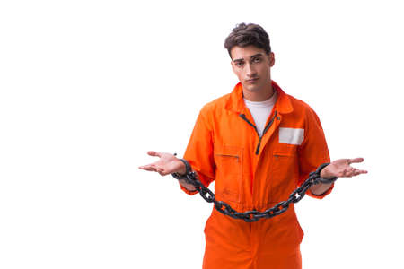 Prisoner with his hands chained isolated on white backgroundの写真素材