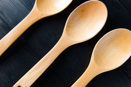 Wooden spoons arranged on tableの写真素材