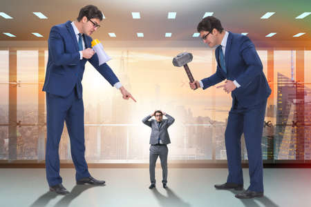 Bad angry boss harassing employee in business conceptの写真素材