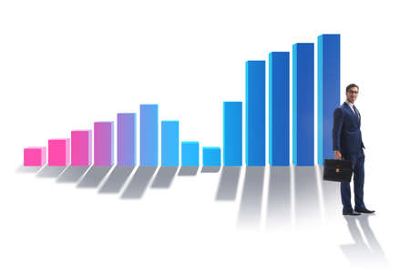 Young businessman in business concept with bar chartsの写真素材