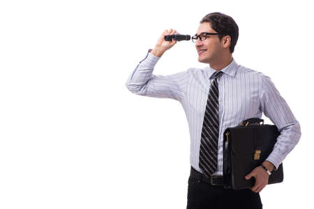 Young handsome businessman looking into future with binocularsの写真素材