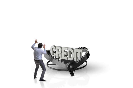 Businessman falling into the trap of loan creditの写真素材
