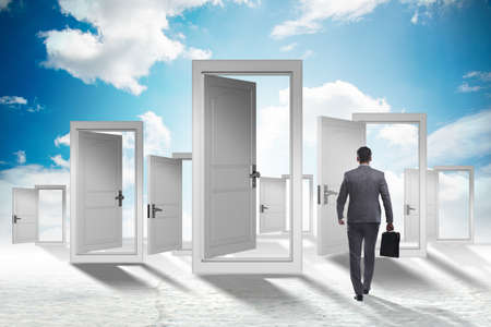 Businessman facing many business opportunitiesの写真素材