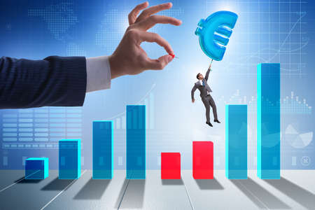 Businessman flying on euro sign inflatable balloonの写真素材