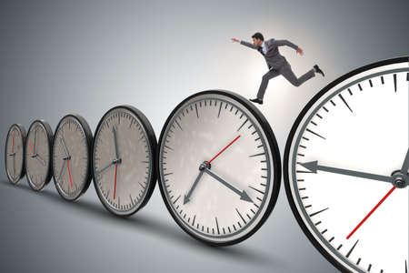 Businessman in time management conceptの写真素材