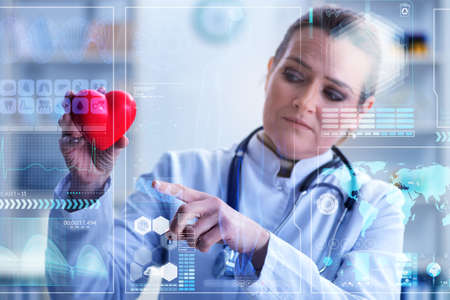 Woman doctor in telemedicine cardiology conceptの写真素材