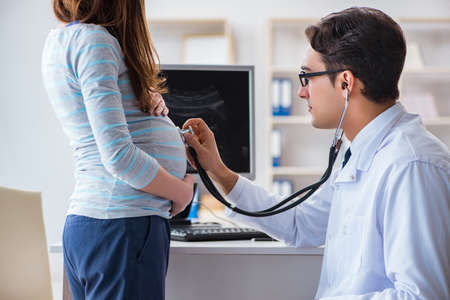 Pregnant woman visiting doctor for regular check-up