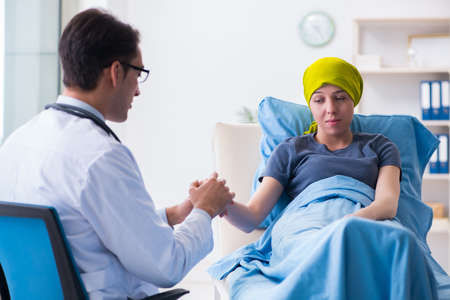 Cancer patient visiting doctor for medical consultation in clinicの写真素材