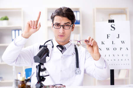 Eye doctor in medical conceptの写真素材