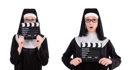 Nun with movie board isolated on whiteの写真素材