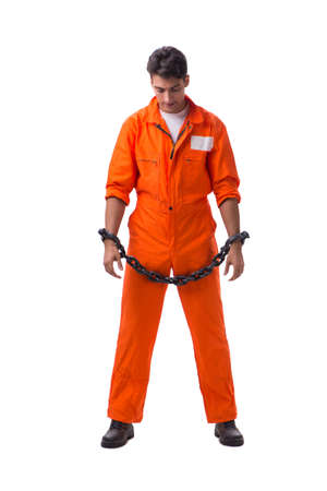 Prisoner with his hands chained isolated on white backgroundの写真素材