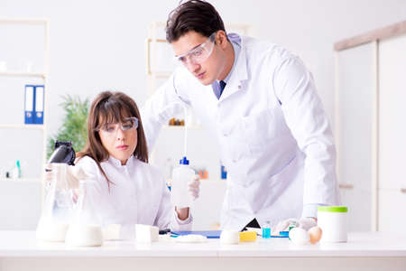 Two lab doctor testing food productsの写真素材