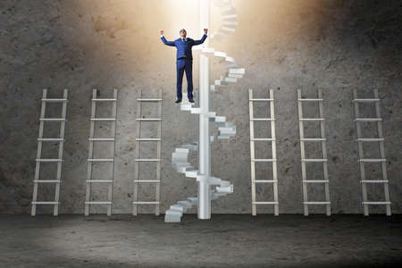 Career progression concept with ladders and staircaseの写真素材