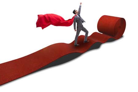 Superhero on the red carpet in success conceptの写真素材