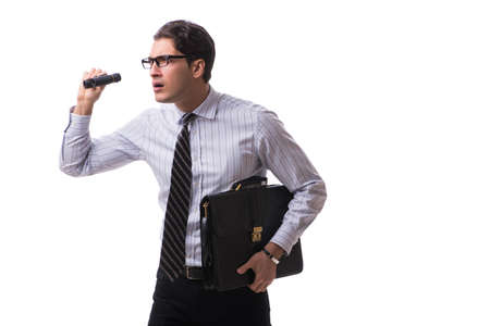 Young handsome businessman looking into future with binocularsの写真素材