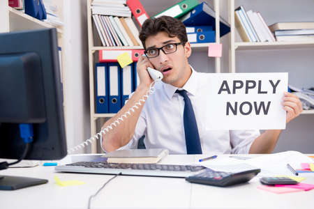 Businessman hiring new employees to cope with increased workloadの写真素材