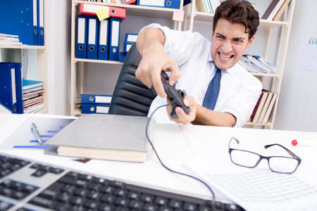 Employee playing computer games in the office