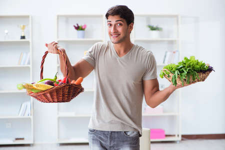 Young man in healthy eating and dieting conceptの写真素材